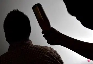 Loud phone leads to beer bottle assault, 62-year-old charged