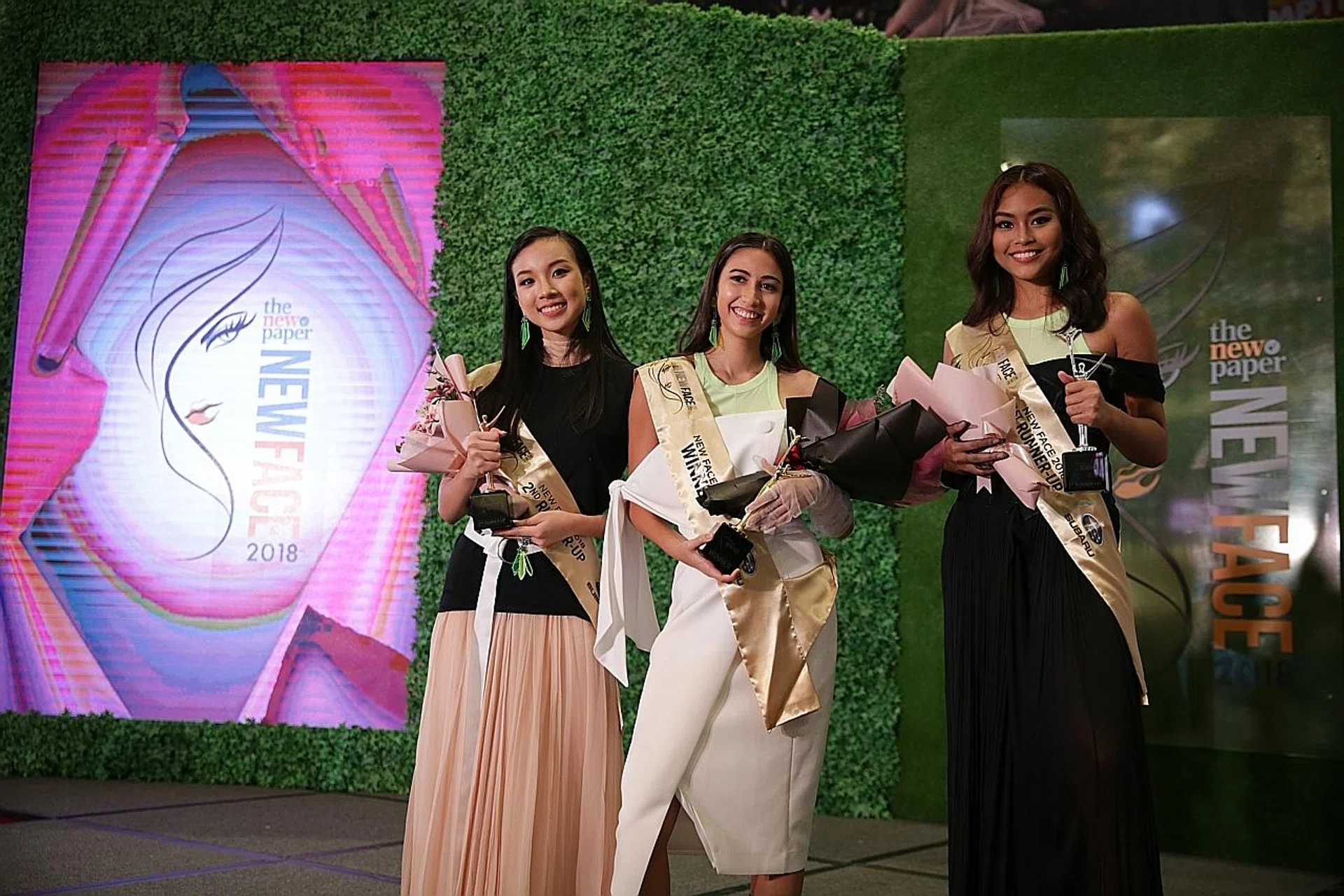 (Above, from left) Second runner-up Cheri Teo, The New Paper New Face 2018 winner Tess Smolens and first runner-up Jane Fernandez.
