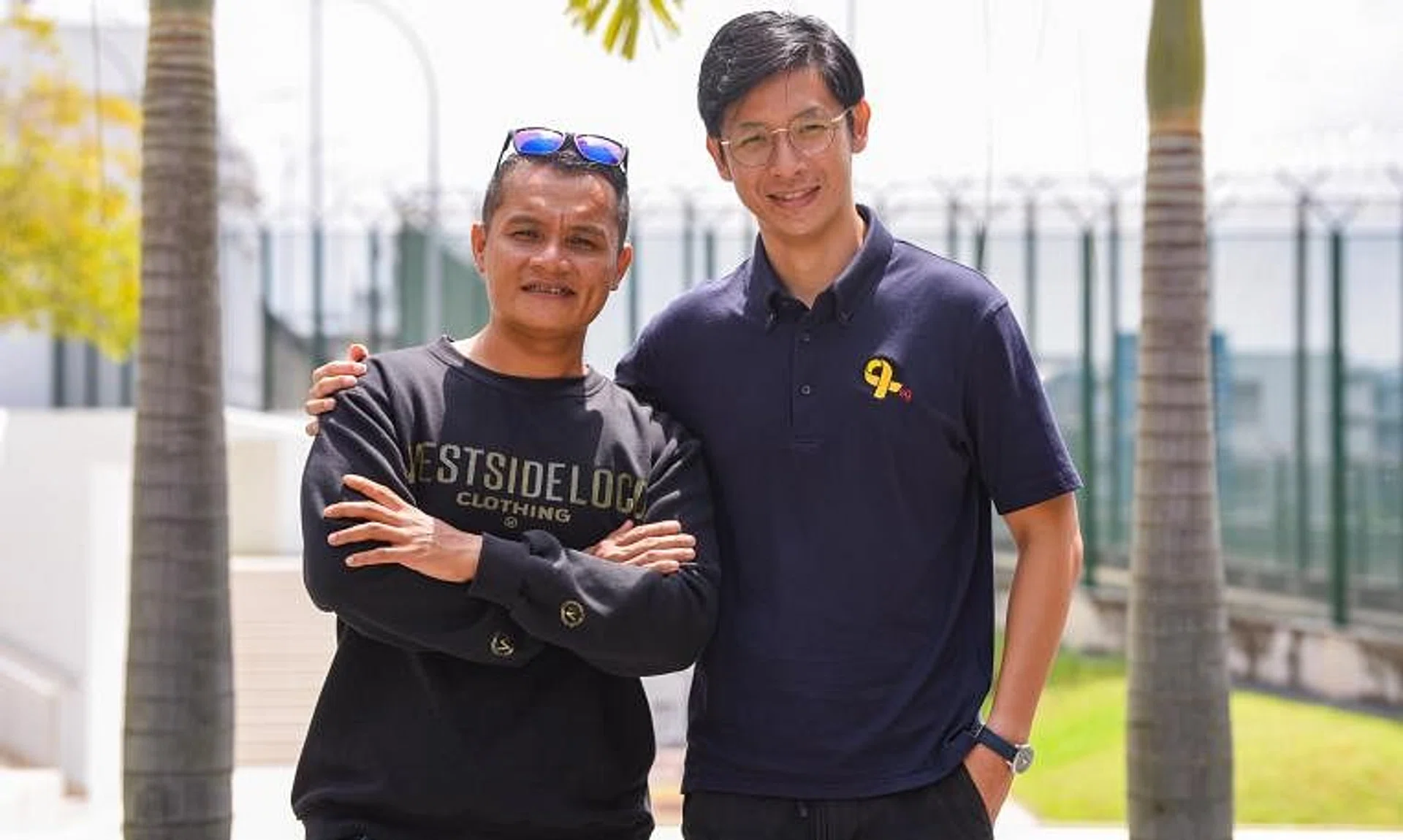 Mr Muhammad Razmi (left) with his career coach from Yellow Ribbon Singapore, Mr Gabriel Lee.