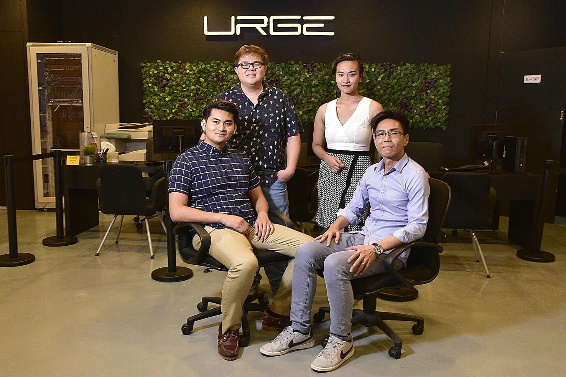 Some of the Urge team, including Mr Derrick Neo (second from left) and Mr Kelvin Ho (far right, seated). 