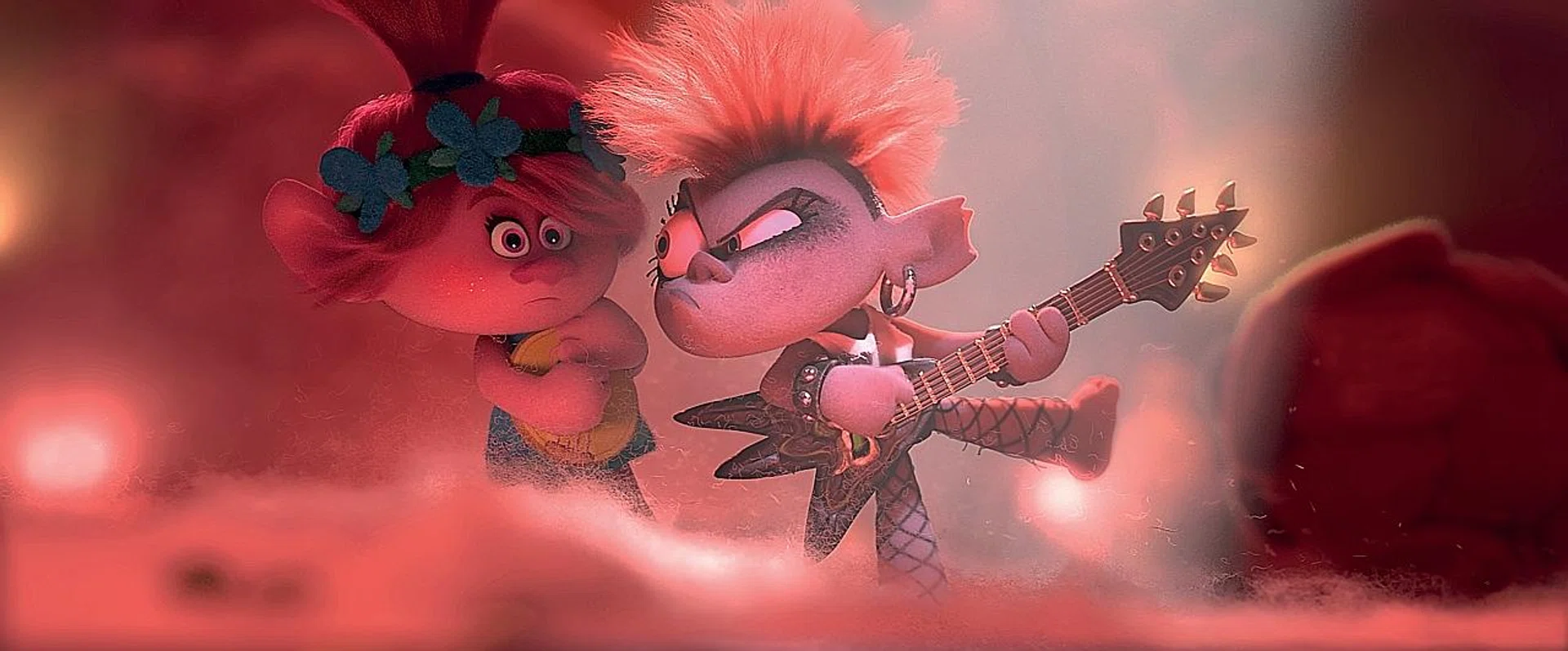 Anna Kendrick and Rachel Bloom voice (left) Queen Poppy and Queen Barb in Trolls World Tour. 