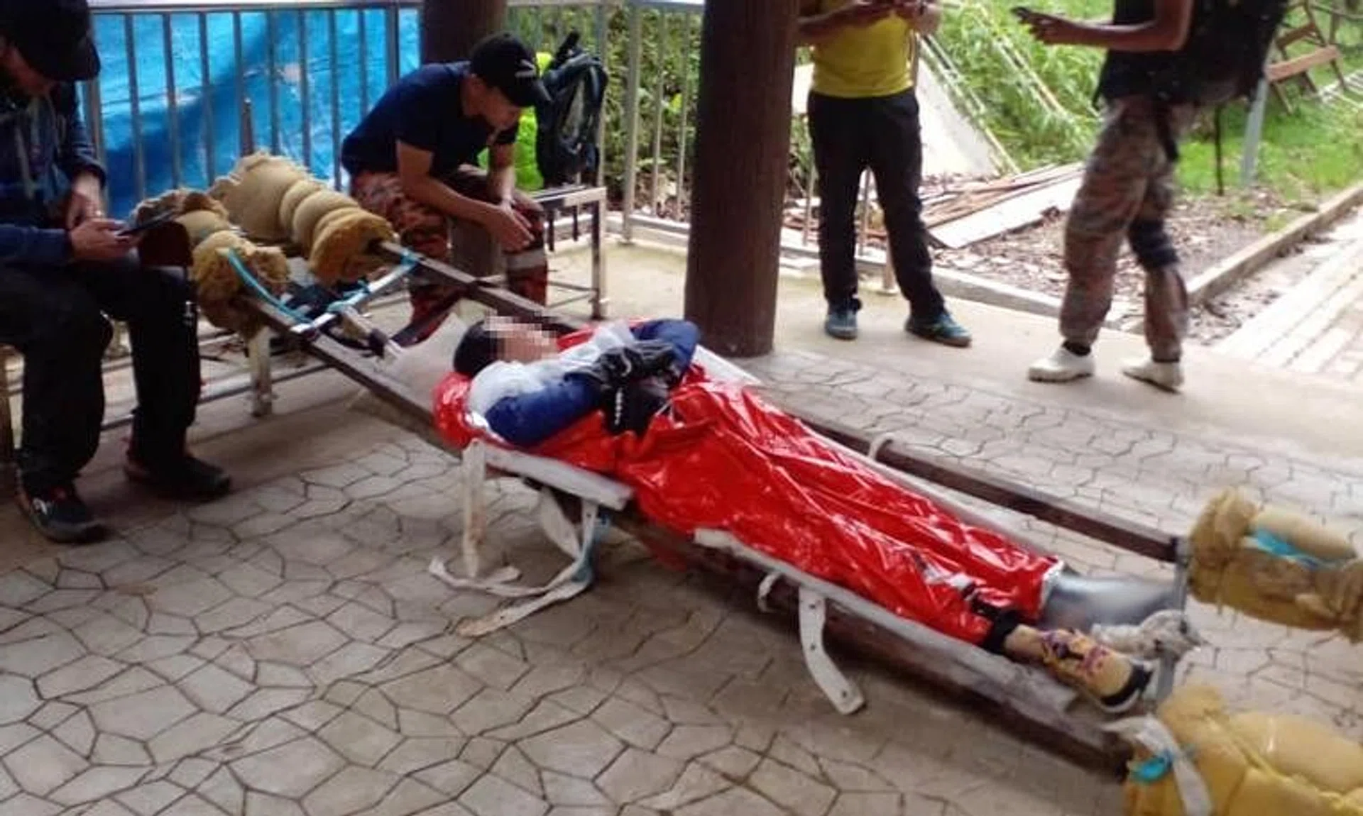 The 41-year-old Singaporean woman was suspected to have broken her left ankle and was taken to the hospital.