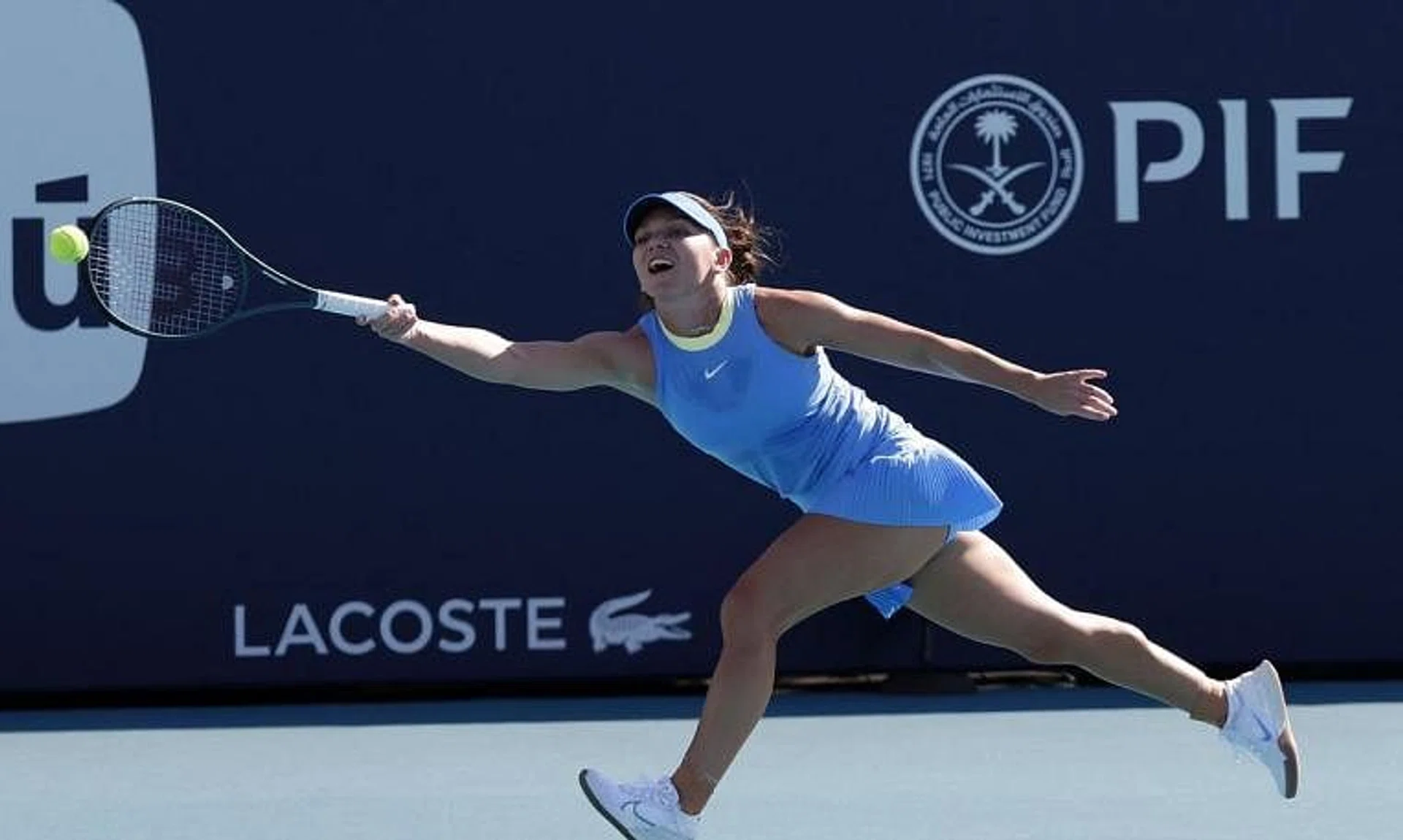 Simona Halep reaching for a forehand against Paula Badosa on day two of the Miami Open.
