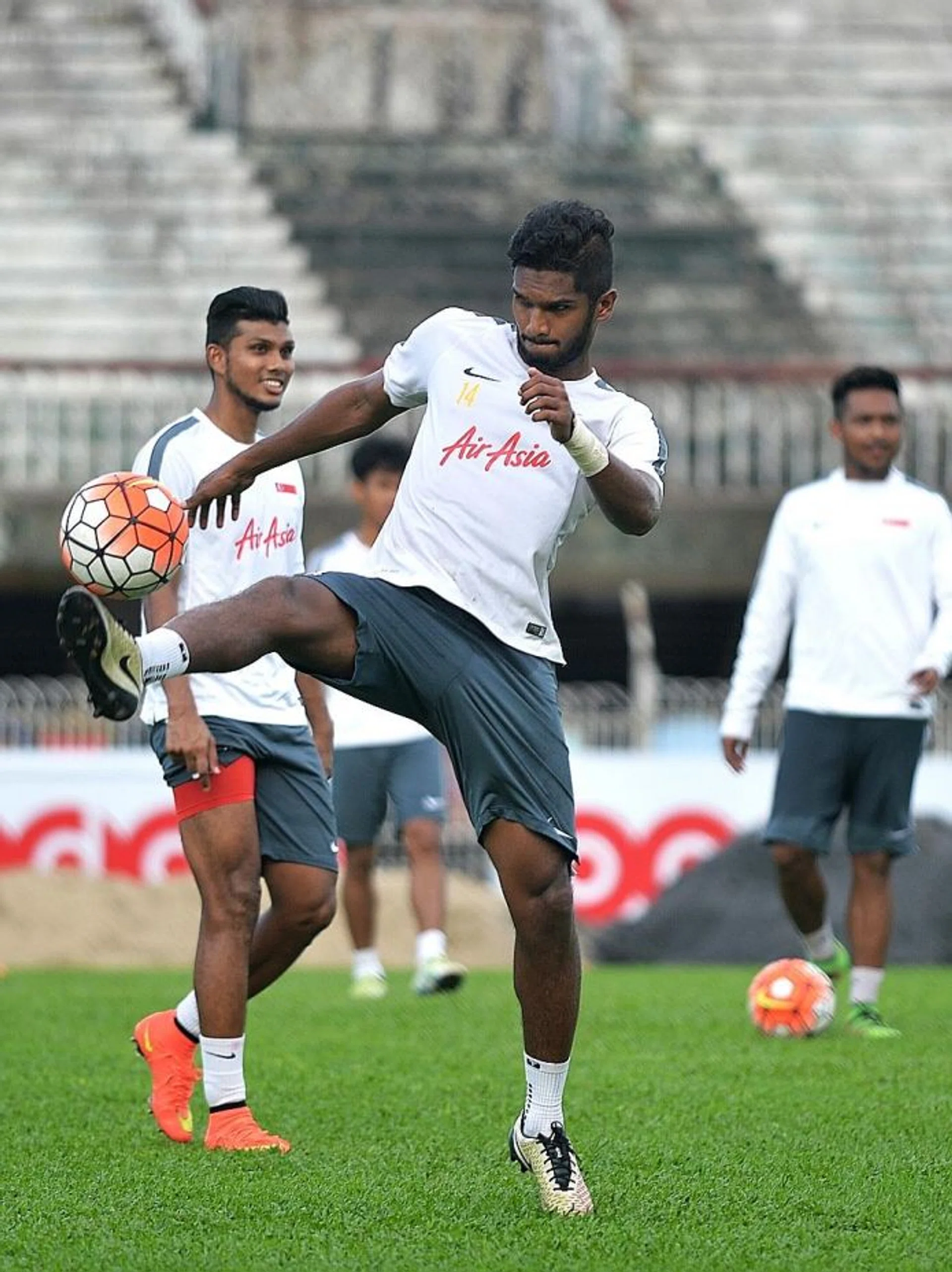 BEST FOOT FORWARD: Hariss Harun's (with ball) ability to play the ball out of defence is one reason behind ex-Singapore coach PN Sivaji's preference for the utility player to stay in the backline.