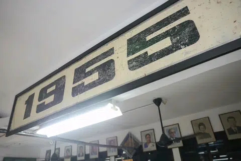 A close-up of the '1955' sign, referencing the year that the Labour Front won the election, seen at Treasure At Home Vintage Store.