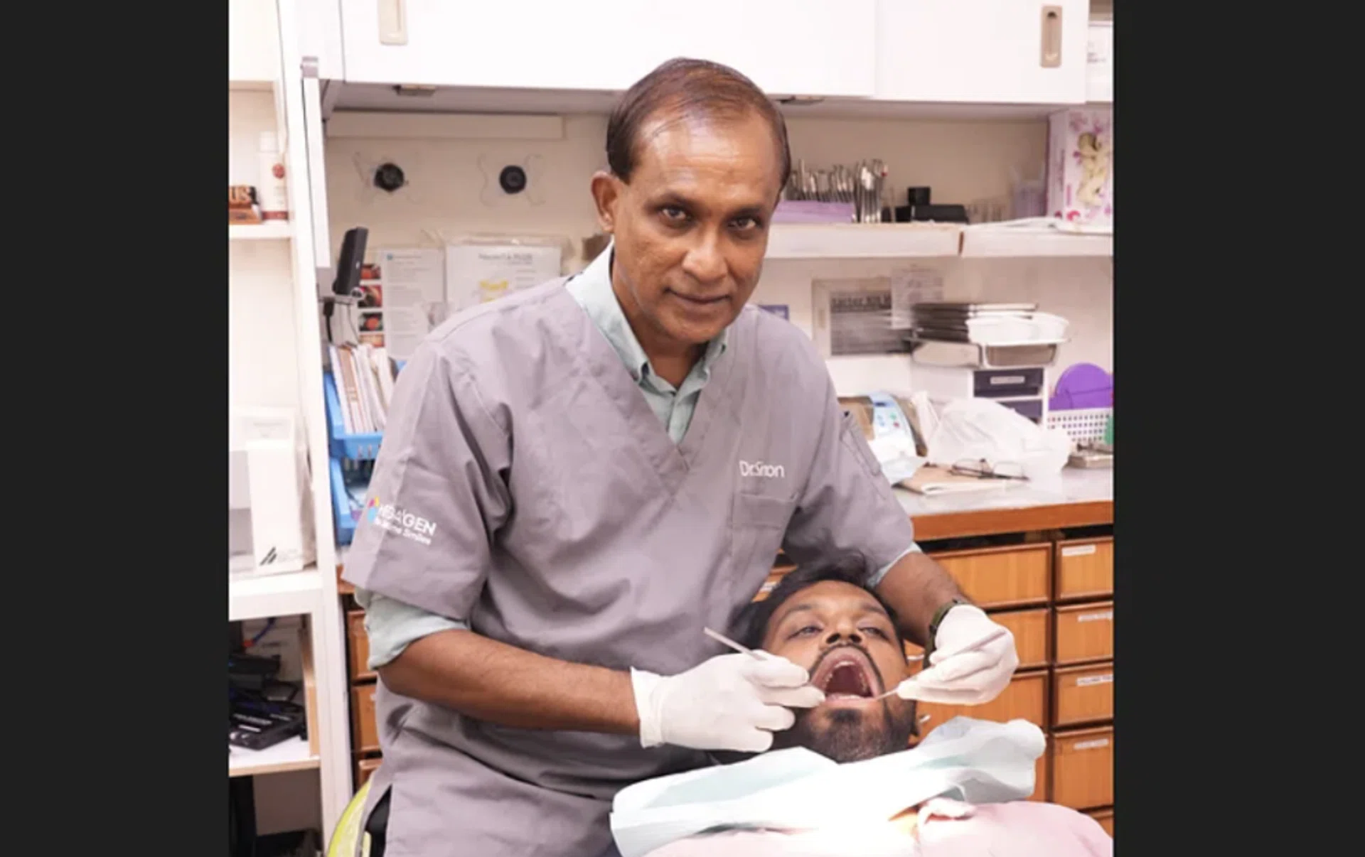 Dr Simon Mahendran pays it forward with affordable dental services for migrant workers.