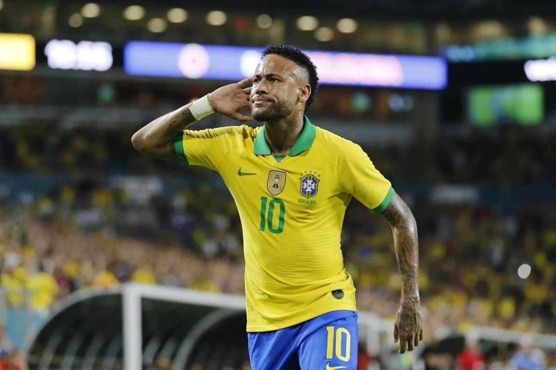Neymar acknowledging the crowd after scoring in Brazil's friendly with Colombia.