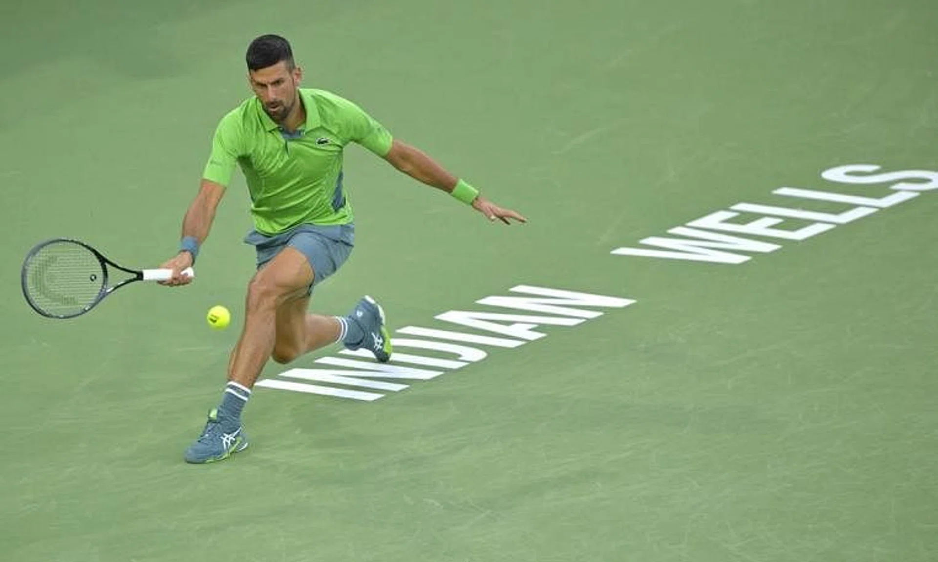 Mar 11, 2024; Indian Wells, CA, USA;  Novak Djokovic (SRB) hits a shot in his third round match against Luca Nardi (ITA) in the BNP Paribas Open at the Indian Wells Tennis Garden. Mandatory Credit: Jayne Kamin-Oncea-USA TODAY Sports