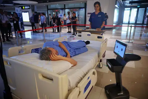 A demonstration of how a concierge robot would attend to a hospital patient at RoboSG! 2025 on March 14.