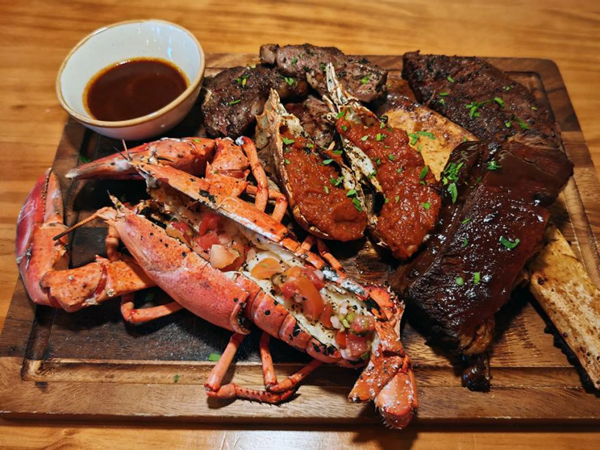 Premium Surf ‘n’ Turf comes with soup of the day and choice of two sides.
