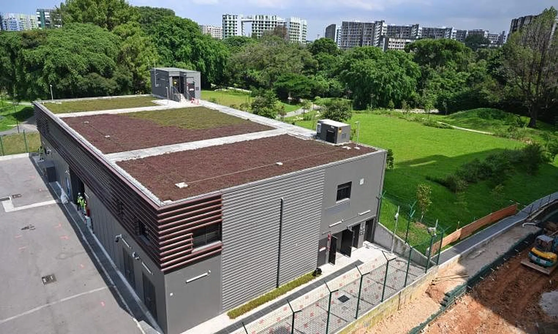 Just a pumping station (left) hints at the existence of the Bidadari USR with its tanks lying beneath Bidadari Park (right).