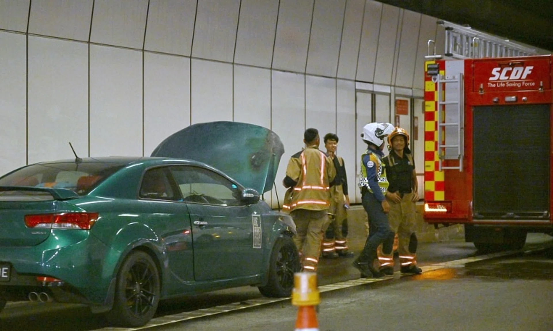 The fire involved the engine compartment of a car and was extinguished by the tunnel’s water mist system before the firefighters arrived.