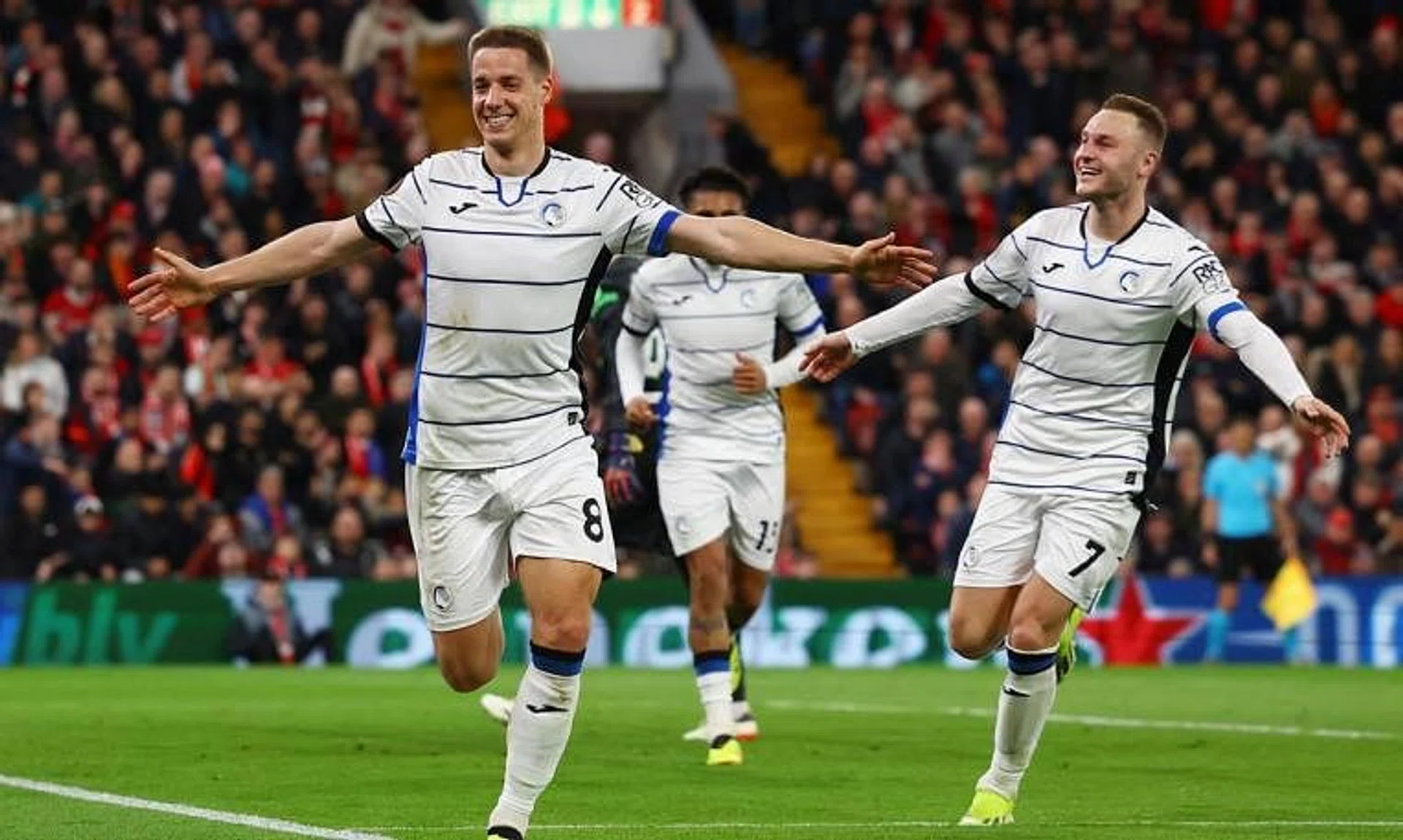 Atalanta's Mario Pasalic celebrates scoring their third goal in the 3-0 Europa League win over Liverpool with Teun Koopmeiners.