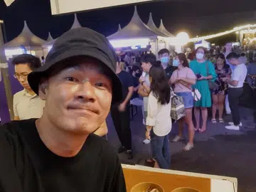 Actor Thomas Ong is busy dishing out wanton noodles at food festival