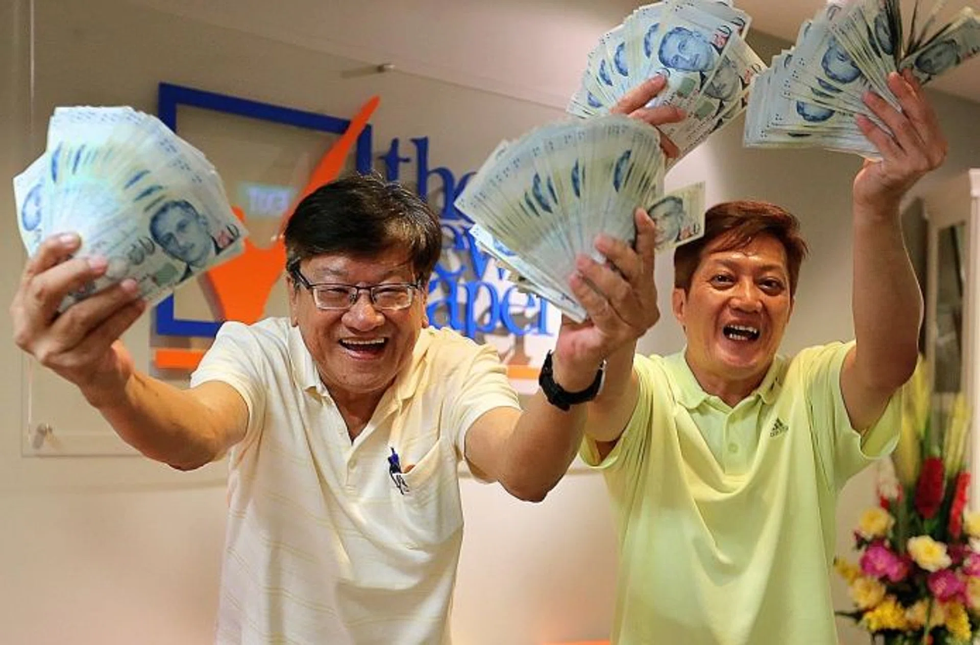 WINNERS: Mr Chiew Hock Hai (left) and Mr Lim Kim Peng each won $6,000 from the jackpot in The New Paper Bonus Challenge in June last year. $17,000 cash to be won in upcoming The New Paper contest