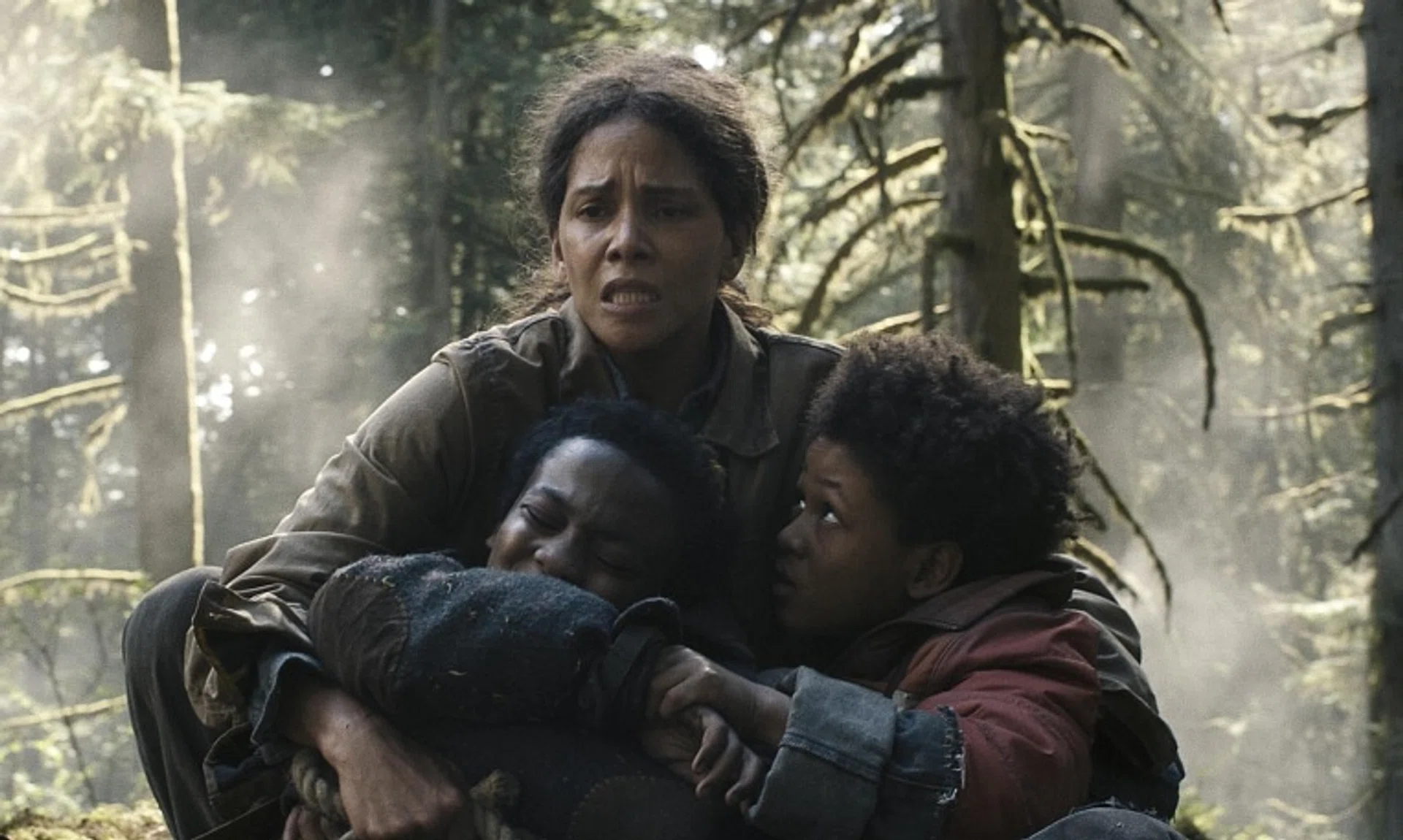 Halle Berry with (from left) Anthony B. Jenkins and Percy Daggs IV in Never Let Go.