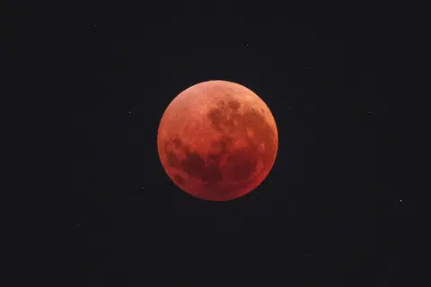 The blood moon in the night sky over Sydney on Sept 8.