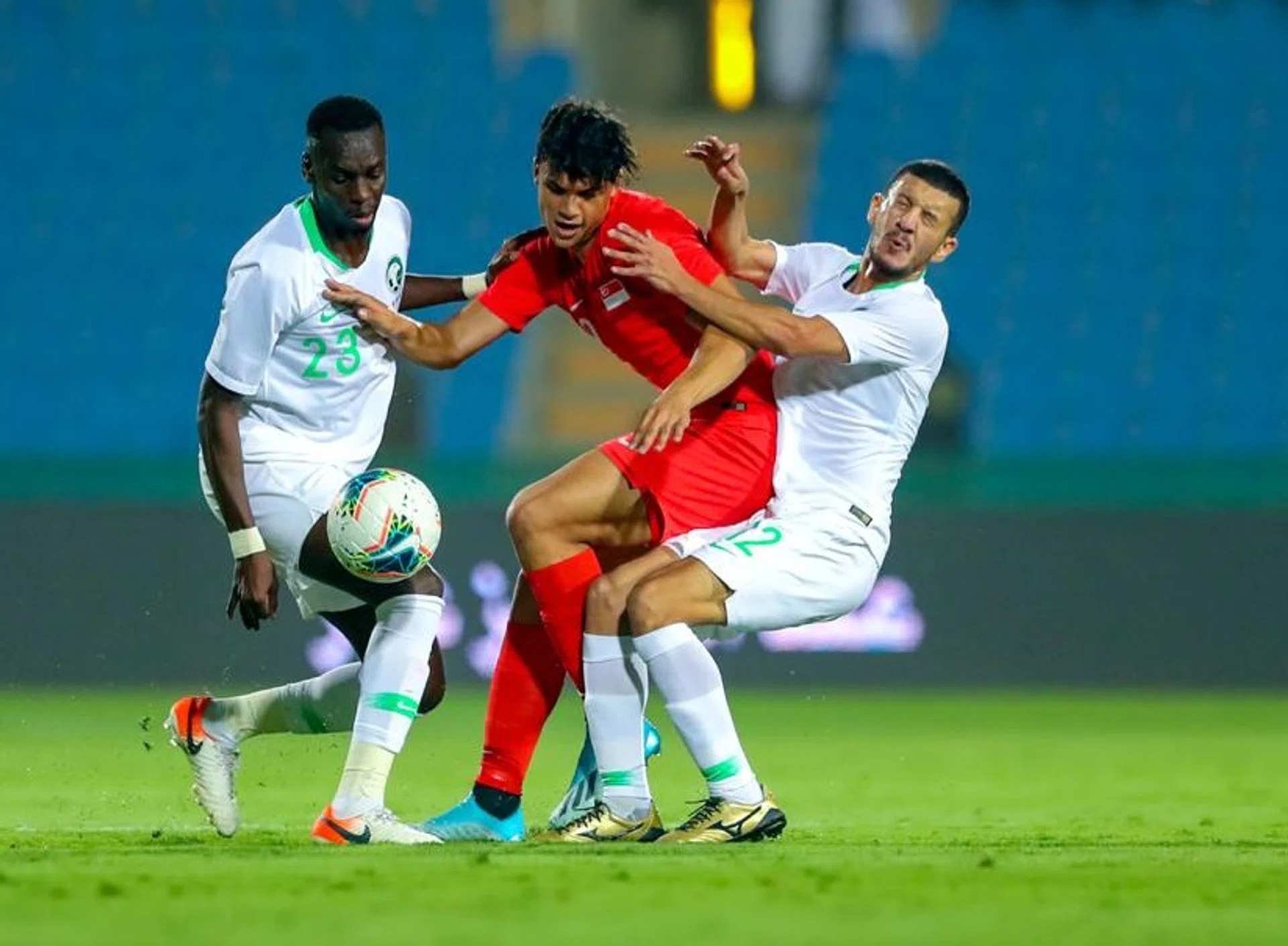 Singapore's Ikhsan Fandi trying to get the better of his marker.