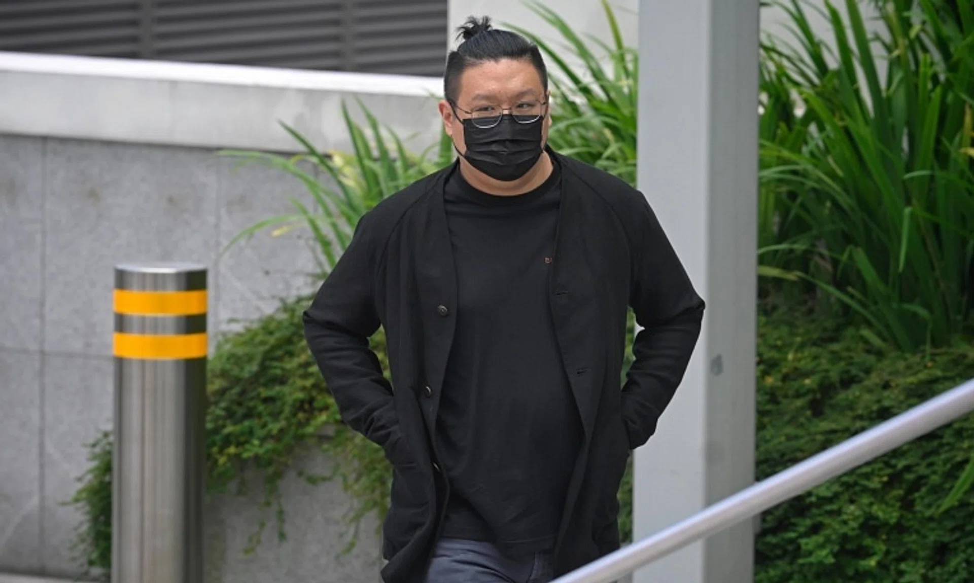 Ng Yu Zhi, the alleged perpetrator of a US$1.1 billion nickel trading scam, arrives at the State Courts on Jan 17, 2023.