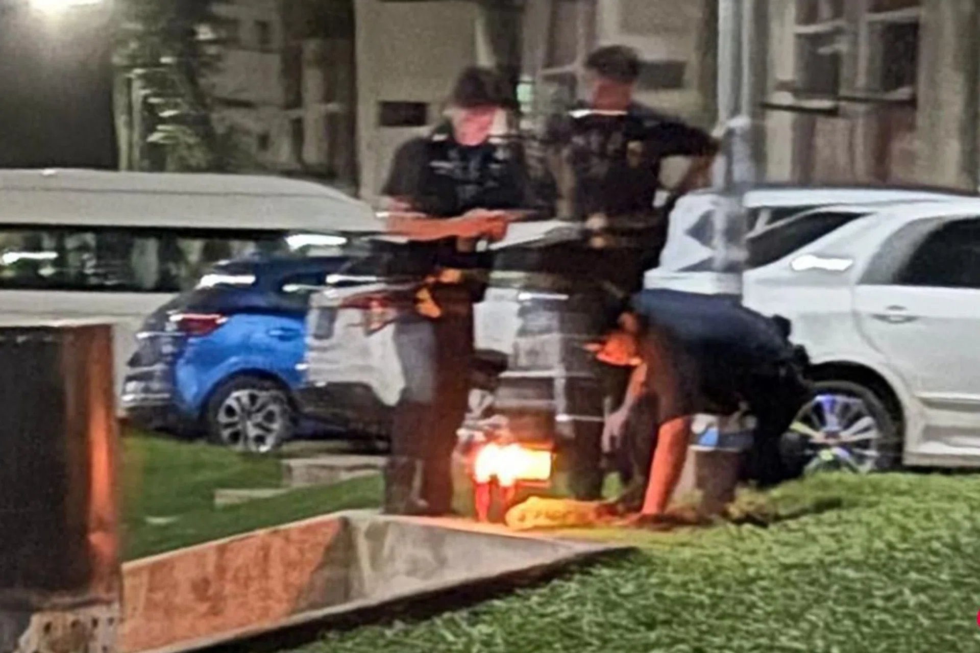 Police officers were seen investigating the scene.