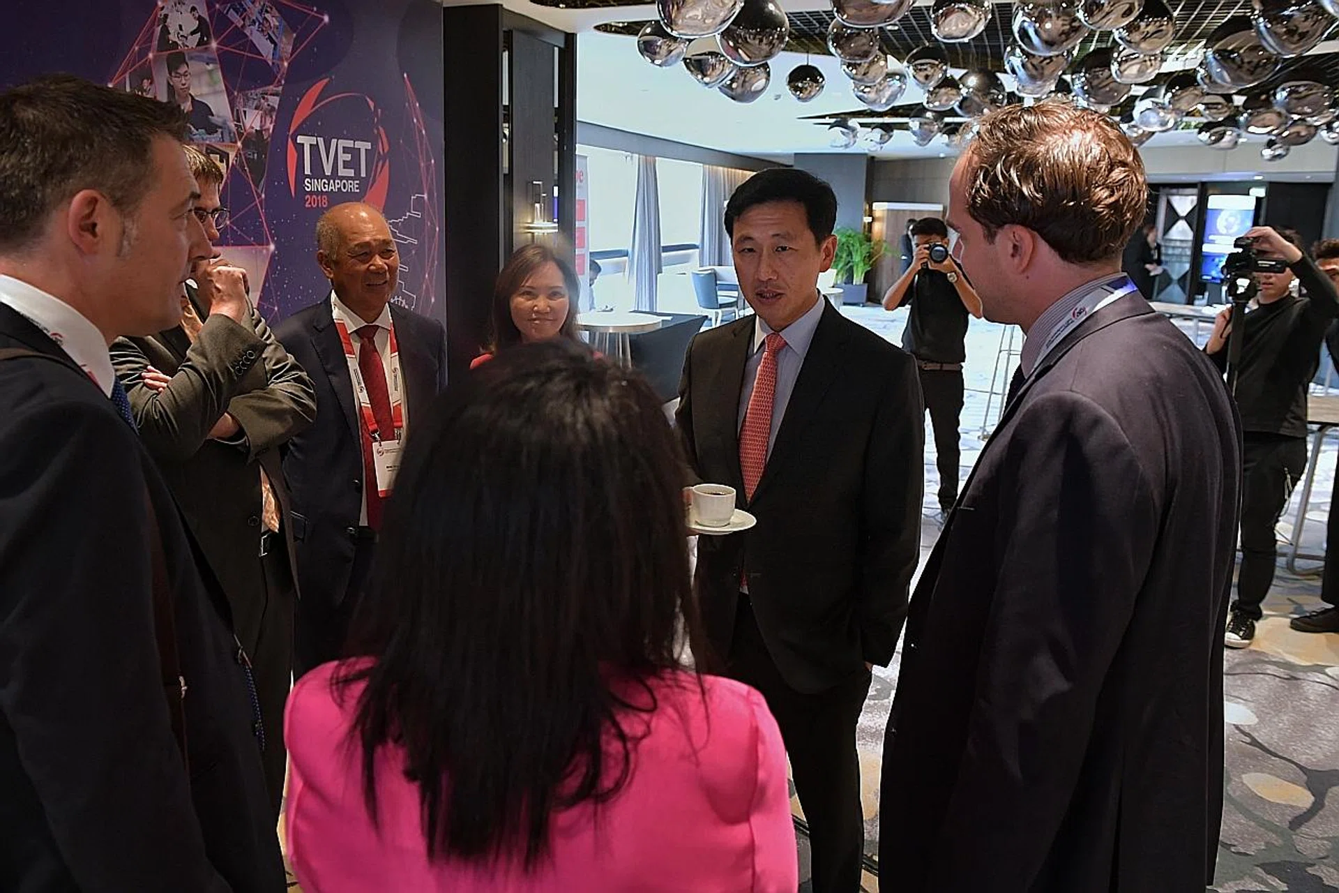 Education Minister Ong Ye Kung speaking to delegates at the Singapore International Technical and Vocational Education and Training Conference at the Raffles City Convention Centre yesterday.