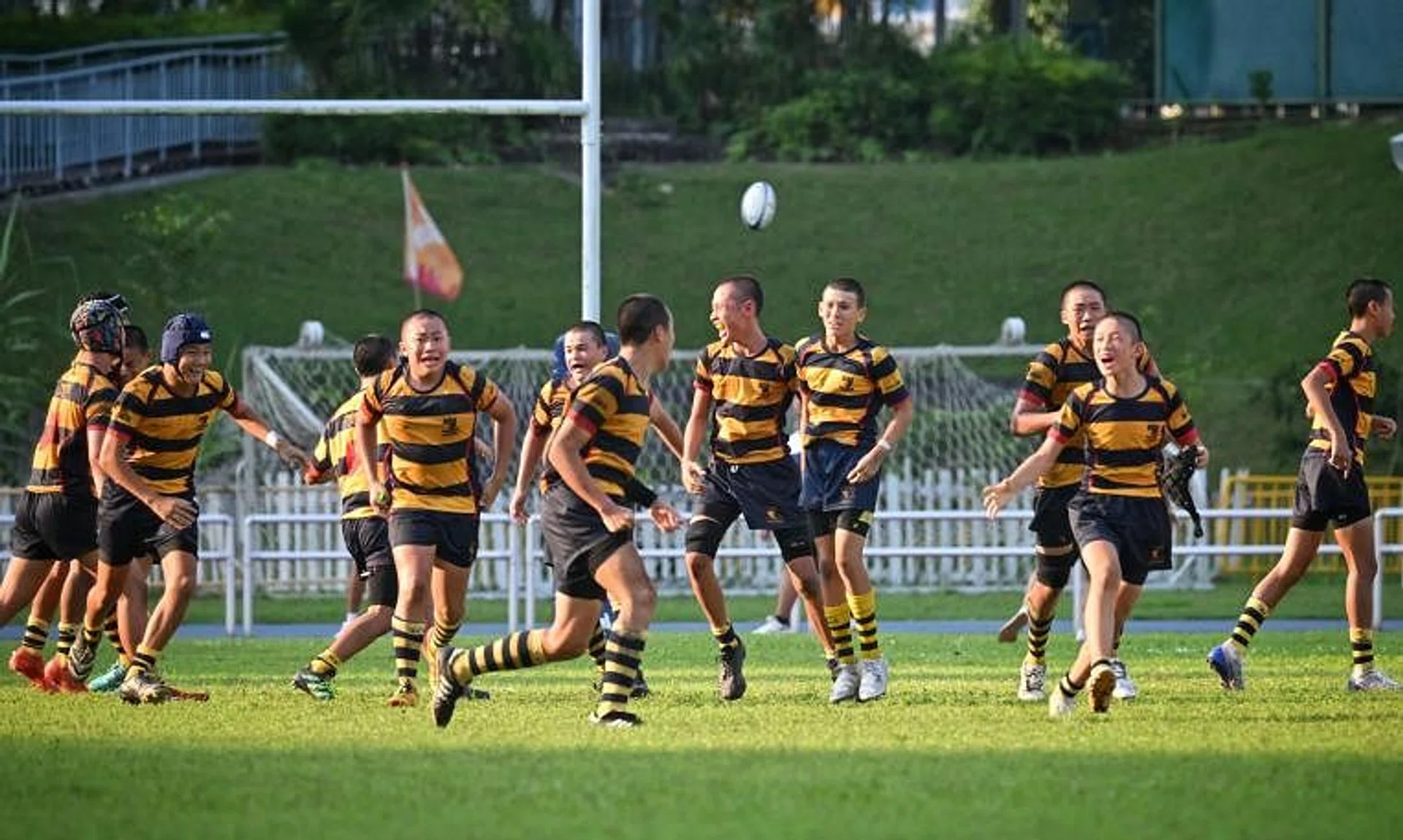 Anglo-Chinese School (Independent) celebrate after St Andrew's Secondary School's Wesley Choo, 13, fired his conversion attempt wide to hand ACS(I) a 36-34 victory in the C Division boys' final.