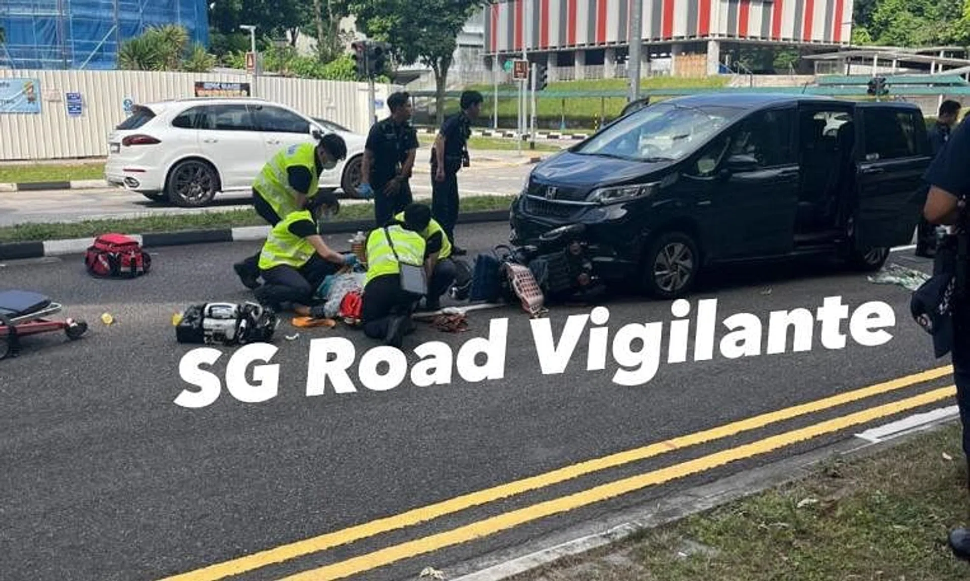 Four paramedics and two police officers can be seen attending to the person on the ground in photos posted online.