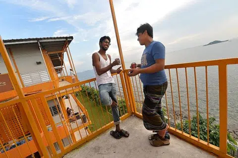 Home for these foreign workers comes with a sea view