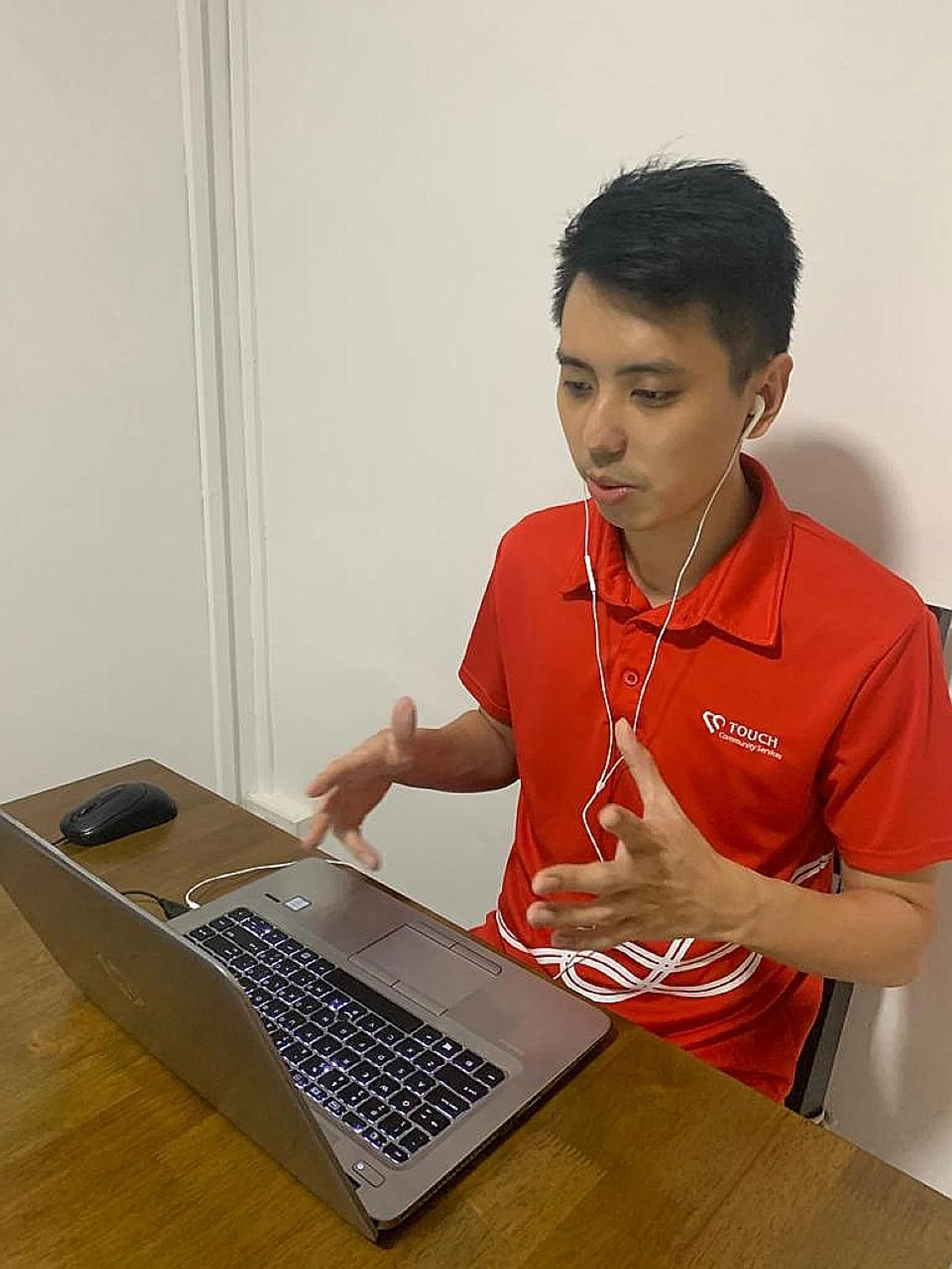 Senior counsellor at Touch Integrated Family Group Shawn Soh providing online counselling. 