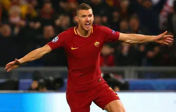 Dzeko scores to help Roma reach last eight
