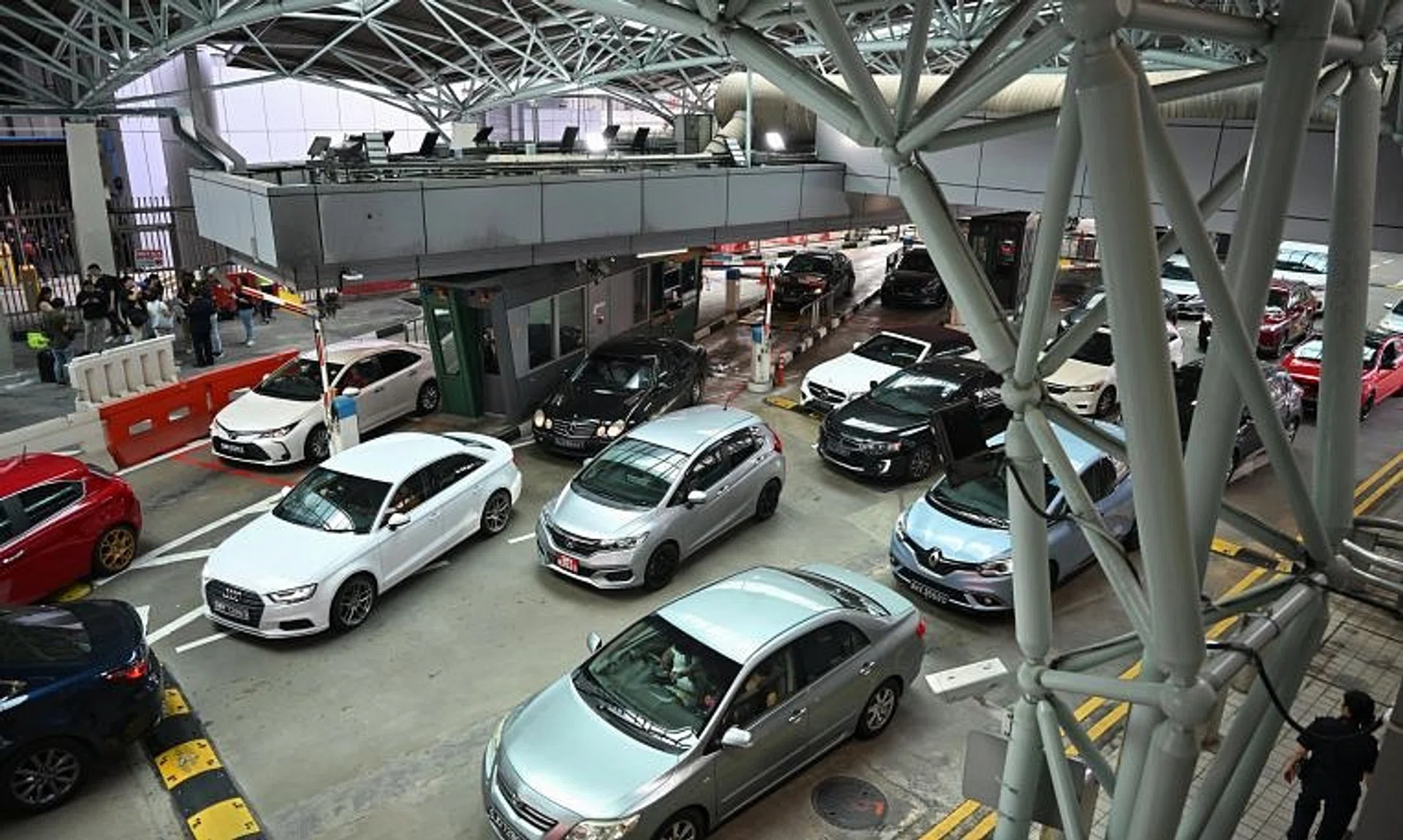 It is an offence to take photos or videos within the checkpoint premises, without consent from the authorities.