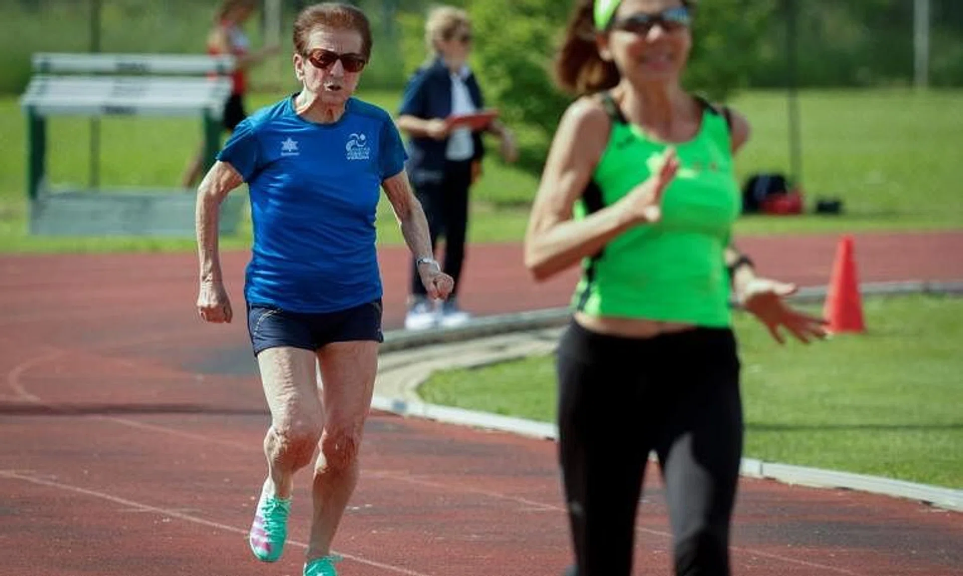 Italian master runner Emma Maria Mazzenga, 90, in action during the women's 100m W90 category race, in San Biagio di Callalta, Treviso, Italy, May 4, 2024. REUTERS/Remo Casilli
