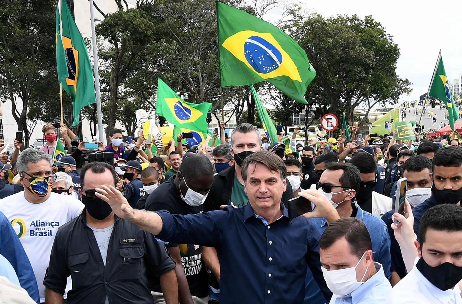 Brazil's President Jair Bolsonaro greeting supporters in Brasilia.  