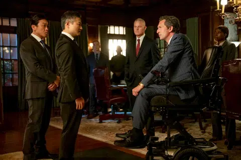 Fictional representatives of the Singapore Government (left) depicted in a scene from the Aug 20 episode of US crime drama series Countdown.