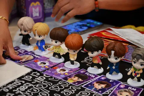 In the first set, known as the Throwback Edition, the seven BTS members - RM, Jin, Suga, J-Hope, Jimin, V and Jungkook - are dressed in classic outfits.
