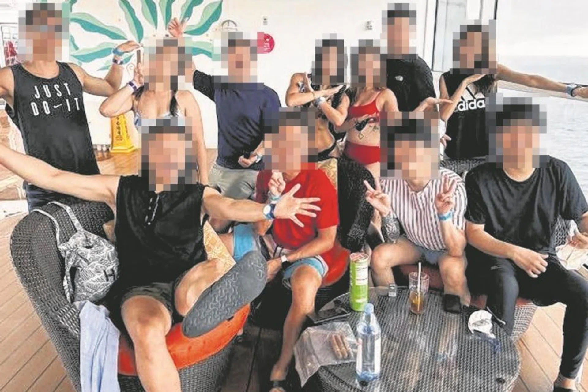 A photo (above) posted on Instagram on Dec 21 shows a group of 11 posing while on a cruise, and a video on Facebook shows a group of at least 10 on a yacht near Lazarus Island. 