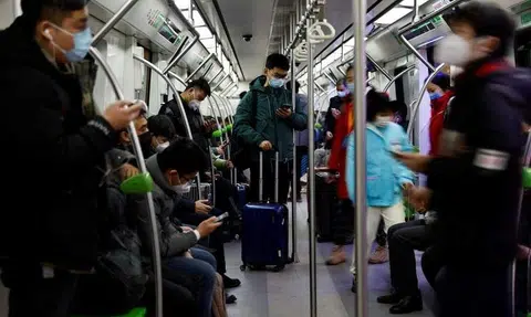 Beijing subway drops mandatory Covid-19 mask rule