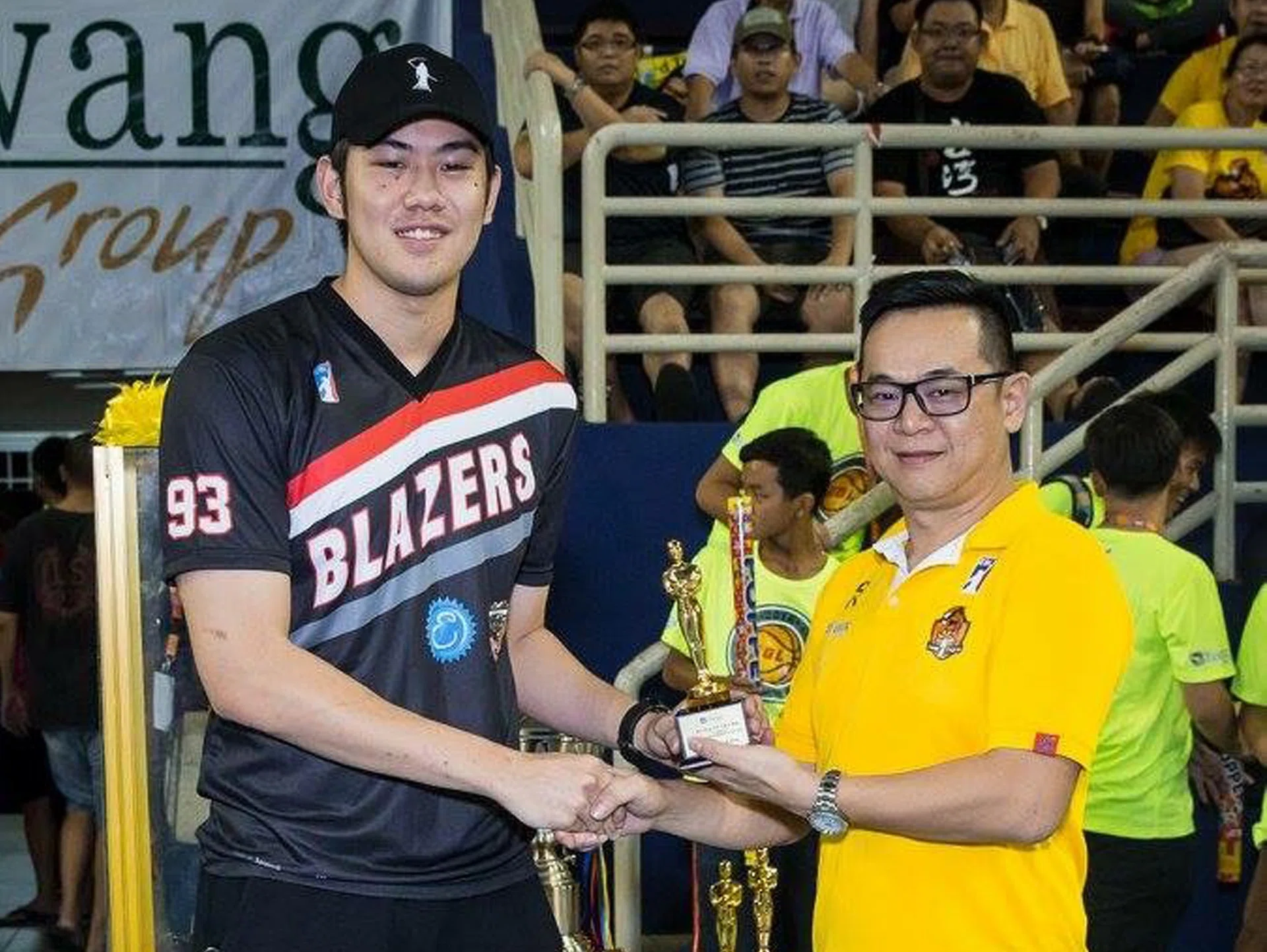 “I’m very honoured to win the individual award, but I had to make the most blocks because I’m the tallest player in the league and it’s what I do — defence is a big part of my game.” - Singapore’s Delvin Goh (left), who was named best block shot artist in the EBL