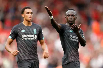 Mane, Firmino help Liverpool pip Saints 2-1