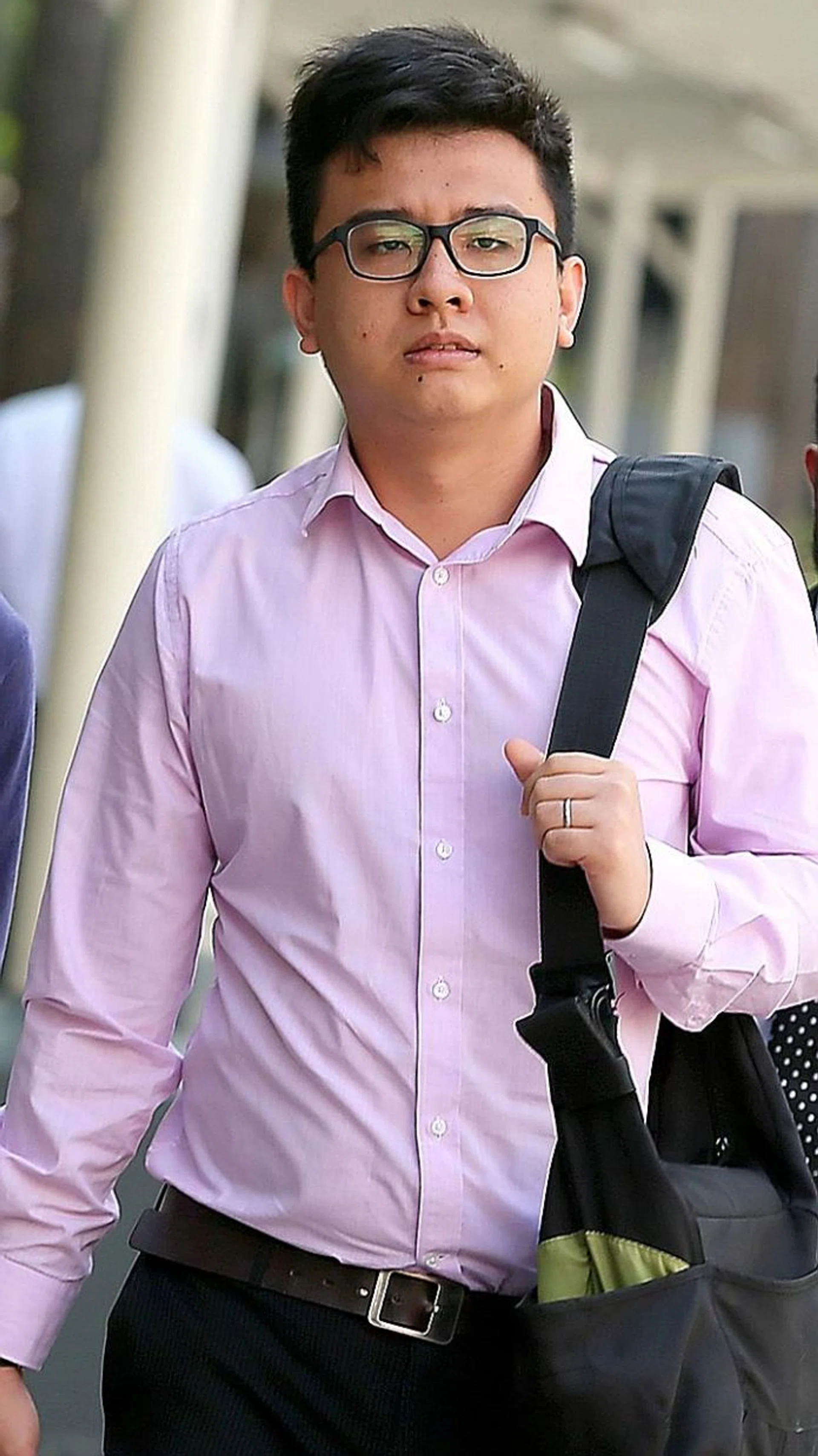 IN COURT: Yang Kaiheng faces seven charges of sedition over his now-defunct socio-political website The Real Singapore (TRS).