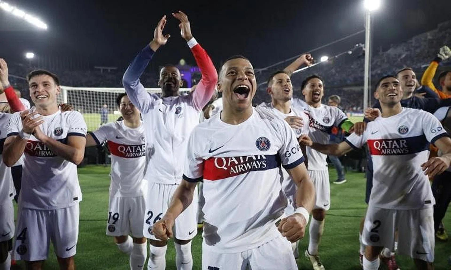 Soccer Football - Champions League - Quarter Final - Second Leg - FC Barcelona v Paris St Germain - Estadi Olimpic Lluis Companys, Barcelona, Spain - April 16, 2024 Paris St Germain's Kylian Mbappe with teammates celebrate after the match REUTERS/Juan Medina