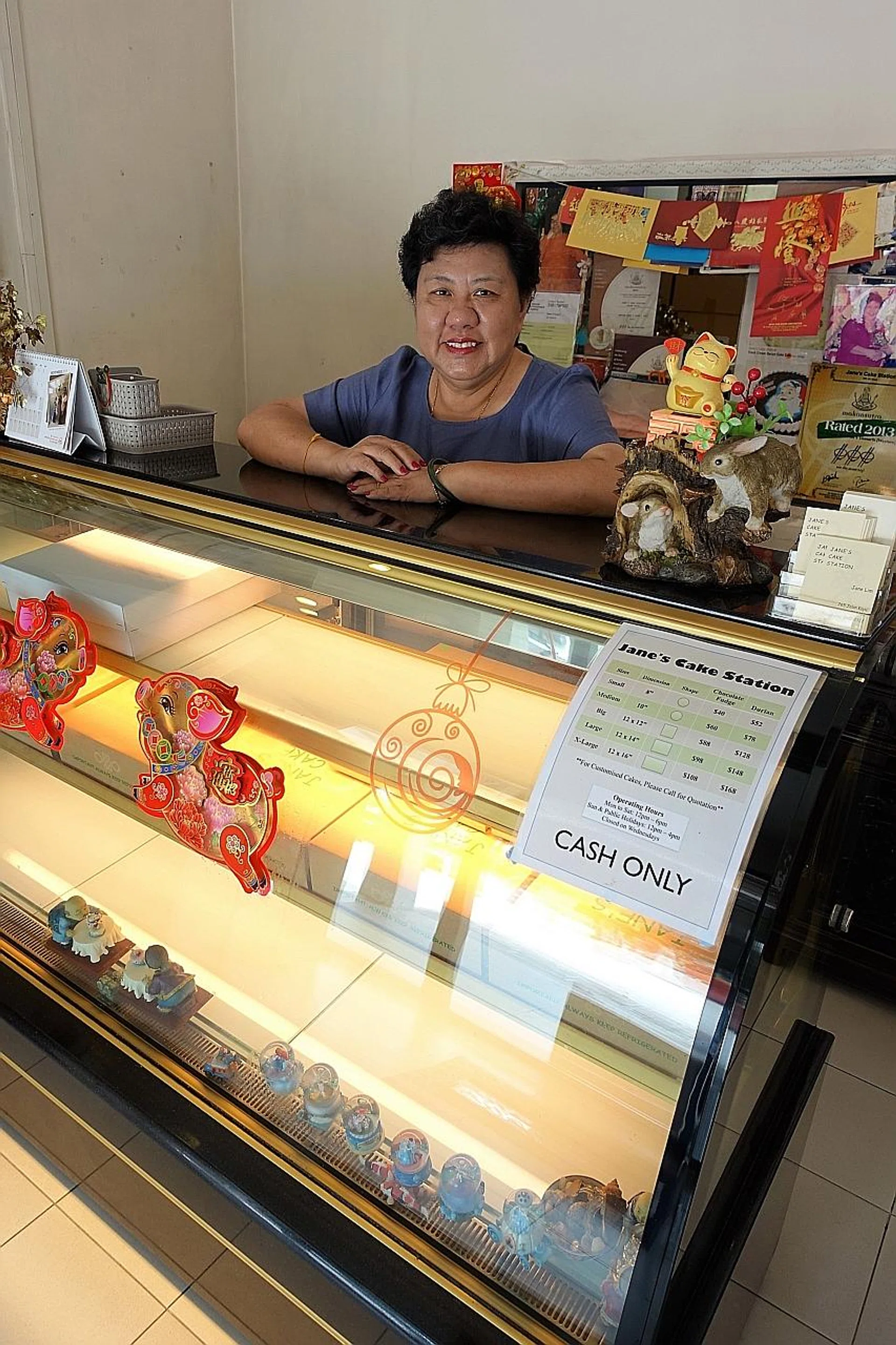 Ms Jane Lim still does not display any cakes in her shop.