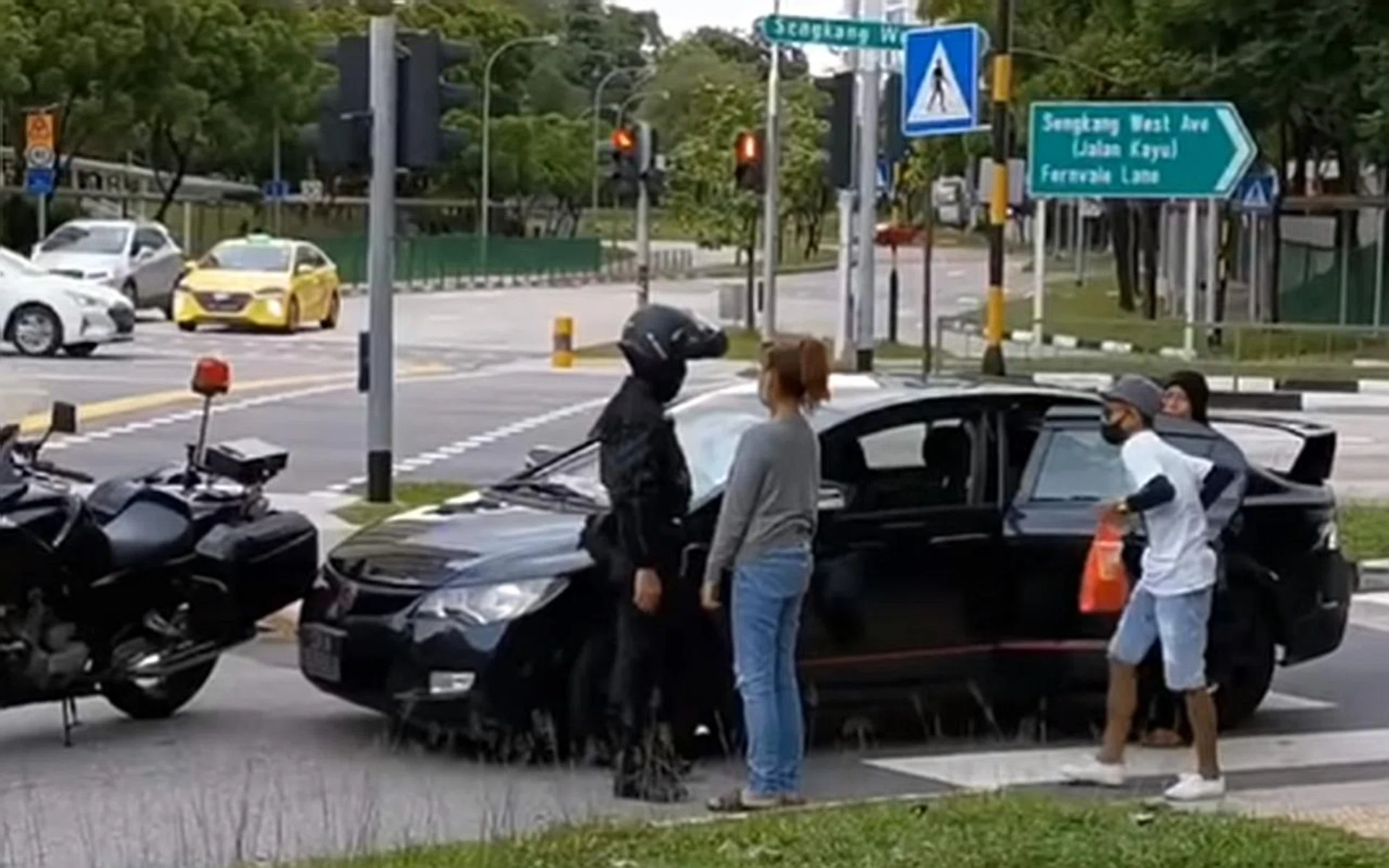 The 21-year-old woman was stopped at the slip road of Sengkang West Avenue leading into Fernvale Road. 
