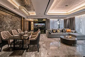 Large-format Italian marble tiles are complemented with beautifully detailed accents for an upscale feel in this penthouse apartment at The Interlace.