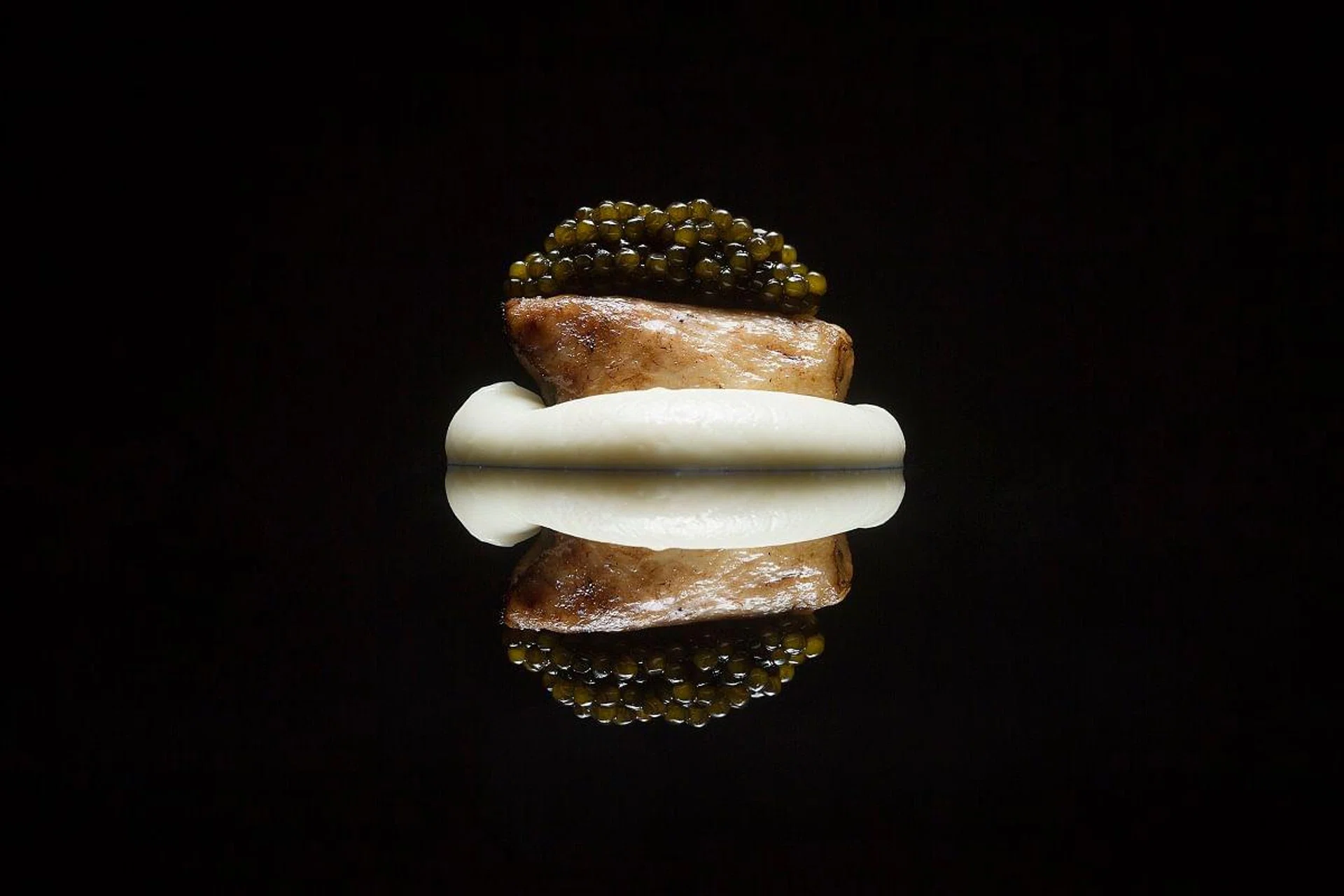 <b>03: DETERMINING ITS WORTH</b></br><br>

Among the determinants of caviar’s value includes color, texture, flavor and maturity – the older, larger and lighter-colored the eggs are, the more expensive. Cheaper caviar of lower quality usually bears a darker color, and often has a much milder and less ‘fishy’ flavor.
