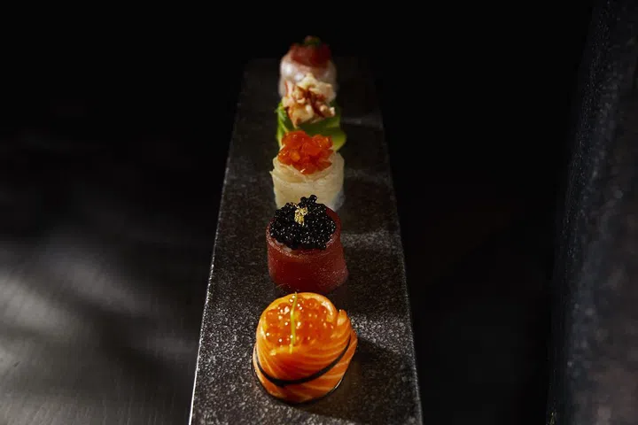 Gunkan Maki - Salmon and Salmon Roe; Tuna and Black Tobiko; Whiting and Salmon Tartare; Avocado and Crab; Alfonsio and Tuna Tartare
