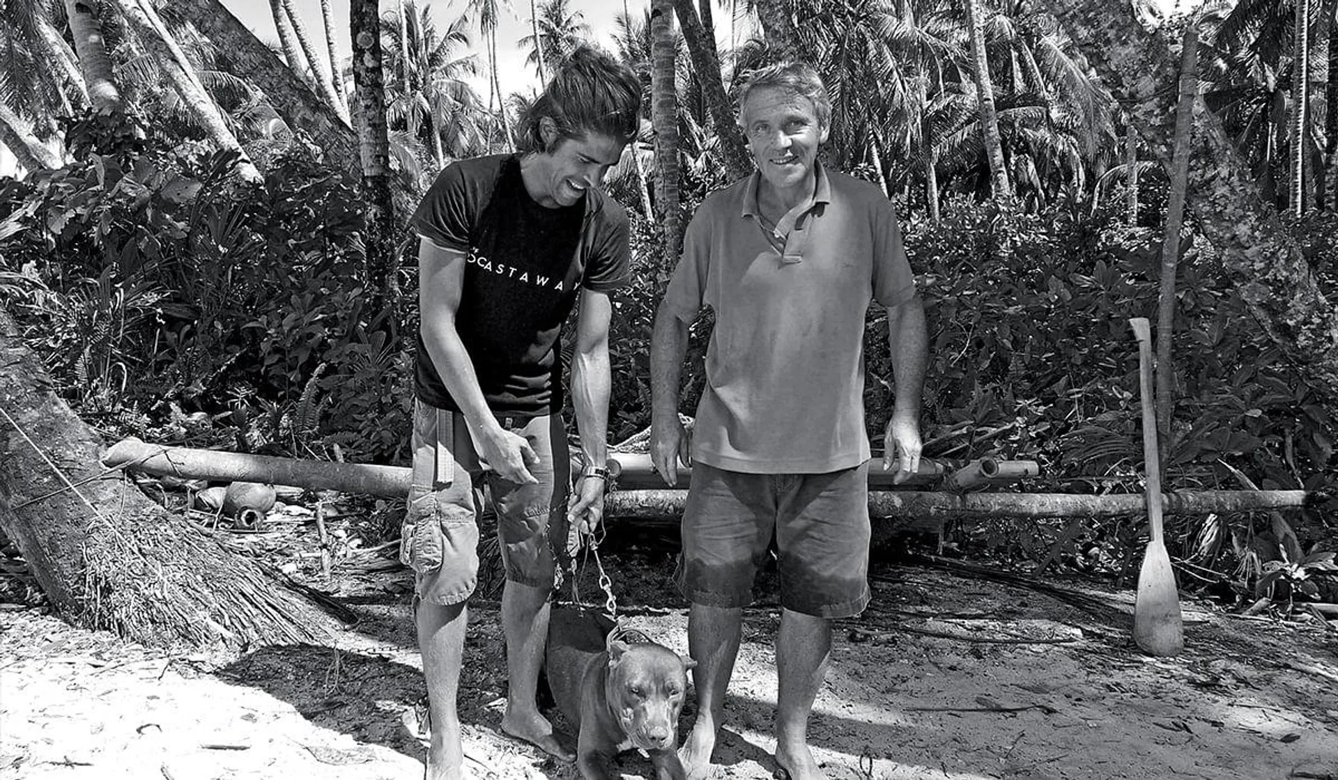 Gauthier Toulemonde (left) with Docastaway founder Alvaro Cerezo and the dog he borrowed to drive away rats and snakes.