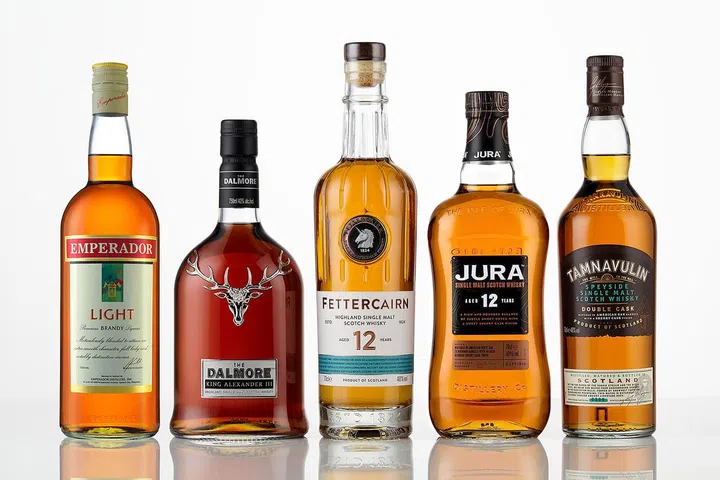 Whyte and Mackay’s iconic whiskies alongside the world’s best-selling brandy (far left) now form part of the expansive portfolio of Emperador Inc.