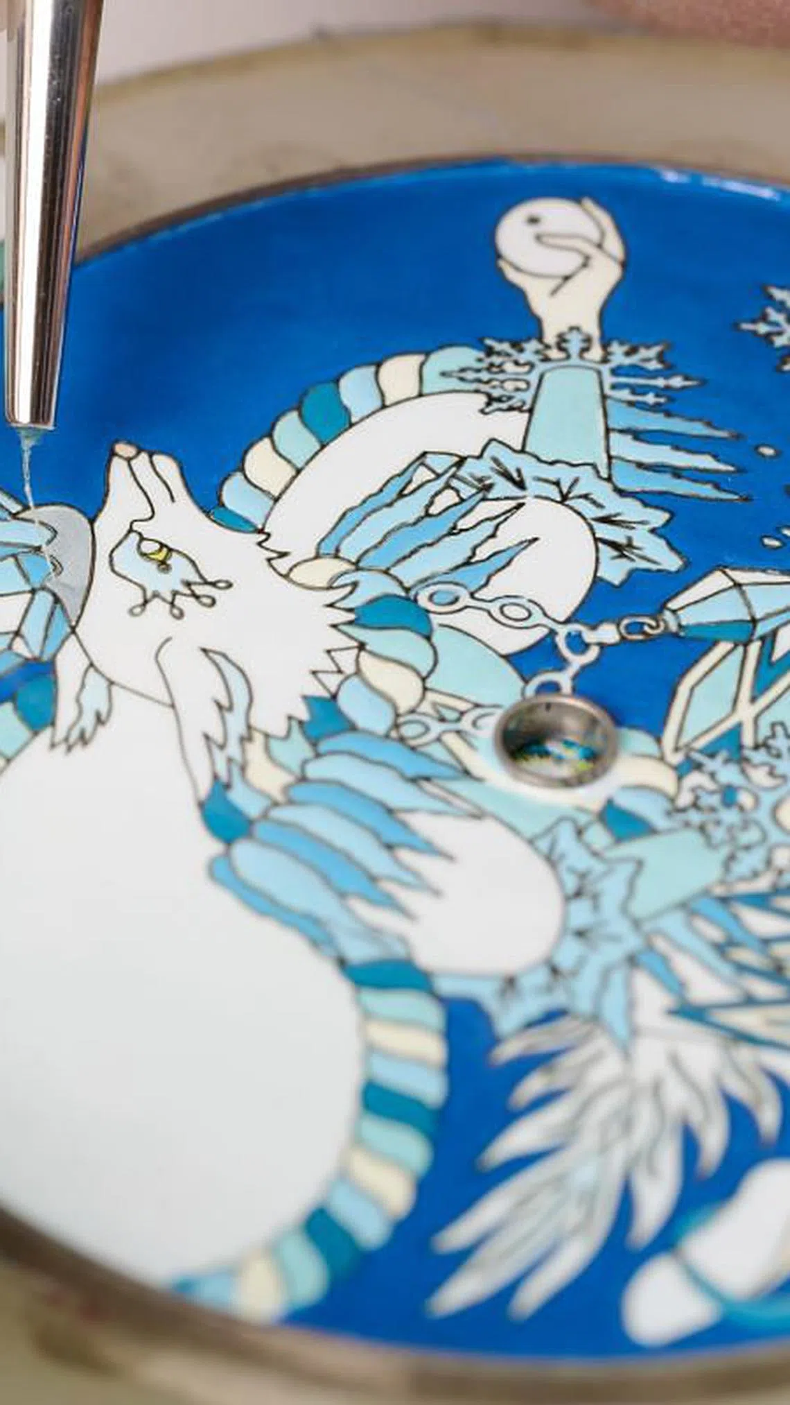 Four whimsical creatures from Hermes scarves come out to play on