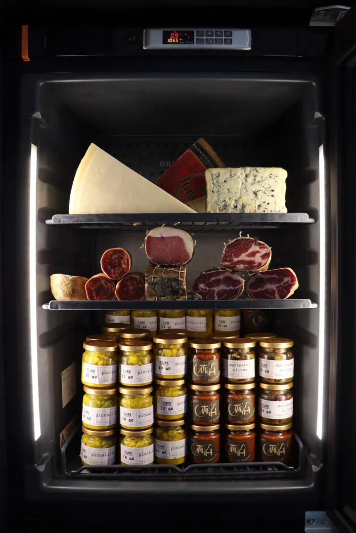 An array of cheeses and cured meats at Club Street Wine Room. 